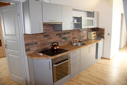 Η κουζίνα ή μικρή κουζίνα στο Large and Beautiful Summertime Apartment