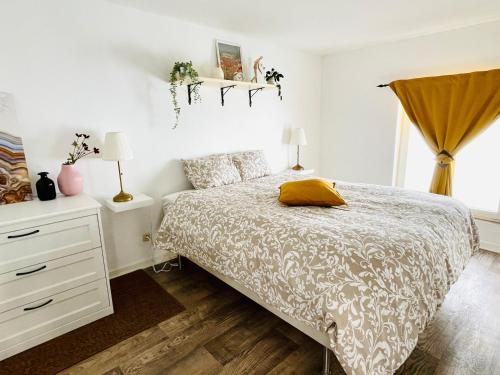 Кровать или кровати в номере Au coeur de la ville