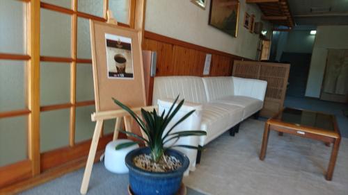 Postel nebo postele na pokoji v ubytování Resort Inn Fujihashi
