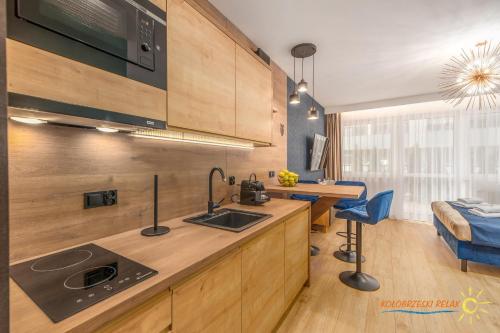 Køkken eller tekøkken på Apartament Kołobrzeski Relax