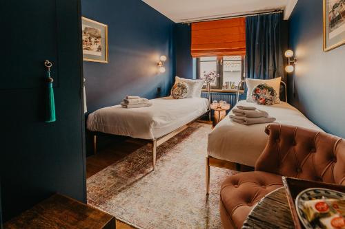 เตียงในห้องที่ Boutique Hotel Zeeuws-Meisje