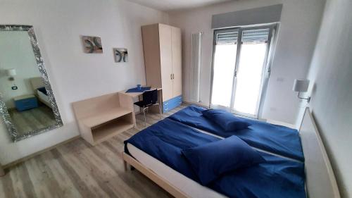 Ένα ή περισσότερα κρεβάτια σε δωμάτιο στο Casa Gemma