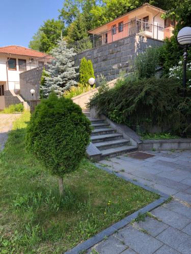 a set of stairs in front of a house at Apartment Nice View in Fojnica