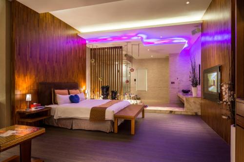 En eller flere senge i et værelse på Norway Forest Villa Motel