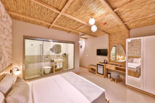 Katil atau katil-katil dalam bilik di Melisa Boutique Hotel & Spa