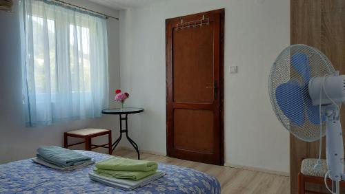 Кровать или кровати в номере Sobe Jana