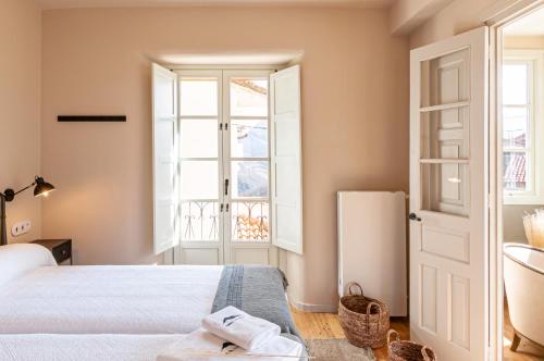 Een bed of bedden in een kamer bij Terra Ecoturismo Casa La Casona