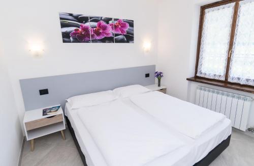 Postel nebo postele na pokoji v ubytování Casa Alberta