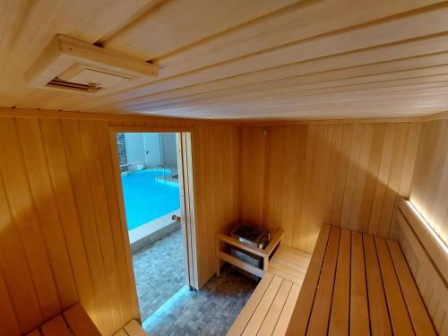 an inside view of a sauna with a pool at Irbēni in Brivkalni