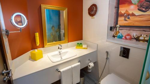 a bathroom with a sink and a mirror at LEGOLAND Hotel Dubai in Dubai