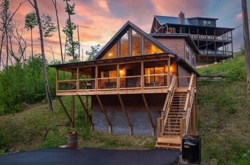 a house on the side of a hill at Creekside Manor Too cabin in Gatlinburg
