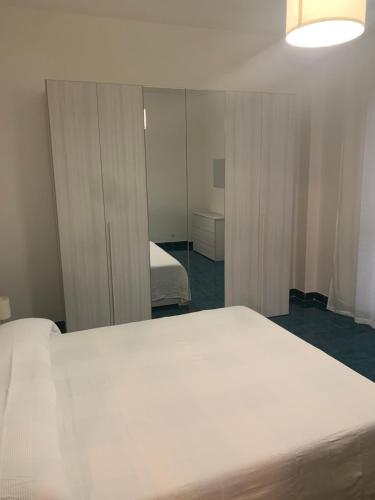 Postel nebo postele na pokoji v ubytování Ladispoli Suite