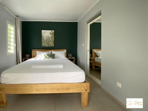 Ein Bett oder Betten in einem Zimmer der Unterkunft résidence ti punch