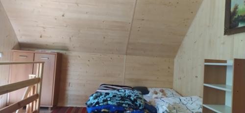 Billede fra billedgalleriet på Domek letniskowy Szramowo (bliźniak) i Szramowo