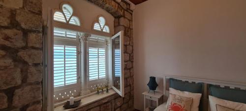 Kúpeľňa v ubytovaní Beach front AmF Holiday Home