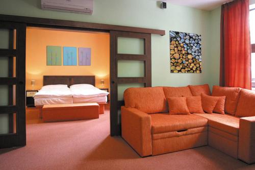 Posezení v ubytování Garni Hotel Cosmopolitan