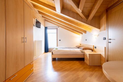 מיטה או מיטות בחדר ב-Chalet Gioia