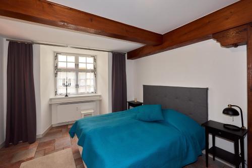 Postel nebo postele na pokoji v ubytování Ferienwohnung in Rheinfelder Altstadt