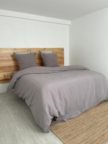 Katil atau katil-katil dalam bilik di Maison proche Omaha Beach vue imprenable sur haras
