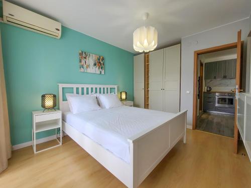 Säng eller sängar i ett rum på Prestige Fort Aparthotel - Private apartment-BSR
