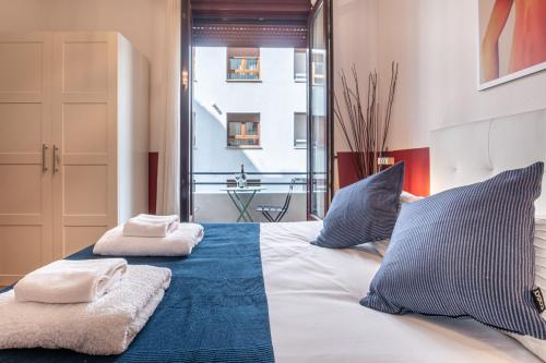 Posteľ alebo postele v izbe v ubytovaní Palermo Beach by Beauty Rentals