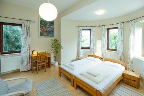 Posteľ alebo postele v izbe v ubytovaní Nemes Apartman