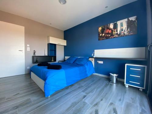 Ένα ή περισσότερα κρεβάτια σε δωμάτιο στο Blue Diamond Room