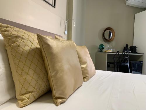 Cama o camas de una habitación en GREEN-HOUSE® B&B Lecce