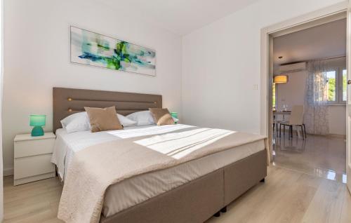 Postel nebo postele na pokoji v ubytování Apartman Leon