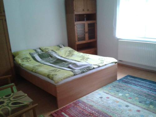 Säng eller sängar i ett rum på Holiday home in Tihany/Balaton 20236