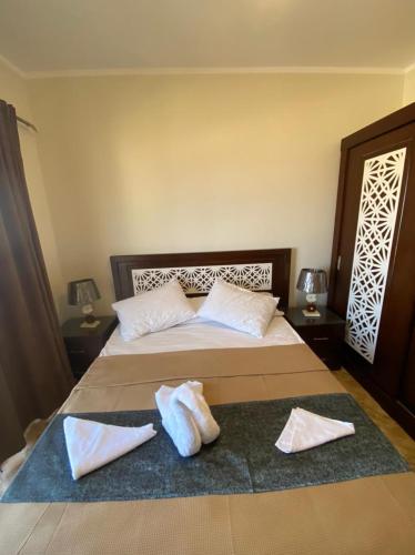 Voodi või voodid majutusasutuse Charbel apartments toas