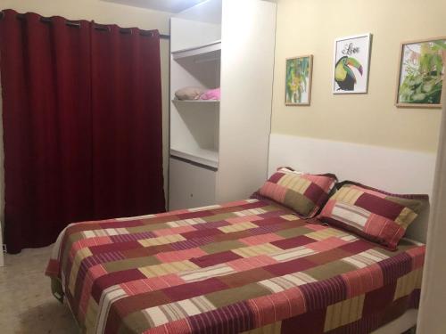 Katil atau katil-katil dalam bilik di Casa completa com piscina e área de laser completa na praia BELA - PB