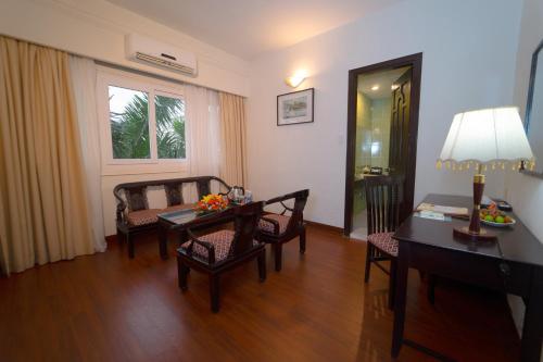 Un lugar para sentarse en Century Riverside Hotel Hue
