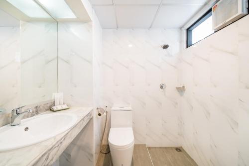 Koupelna v ubytování Niran Grand Hotel