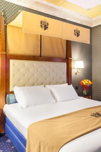 Cama o camas de una habitación en Hotel Manfredi Suite In Rome