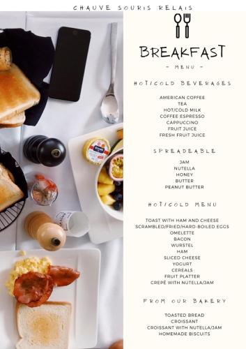 a page of a menu for a breakfast meal at Chauve Souris Relais in Anse Volbert Village