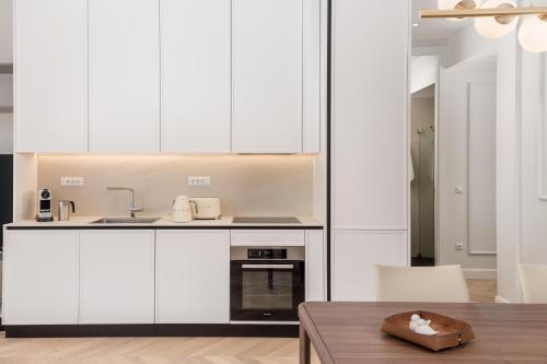 Η κουζίνα ή μικρή κουζίνα στο Plaza Apartments