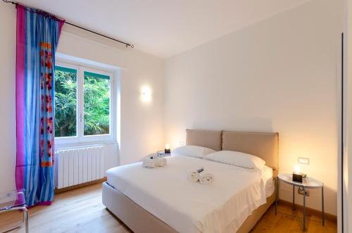 Posteľ alebo postele v izbe v ubytovaní JOIVY Family Apt for 6, in Santa Margherita near Beach