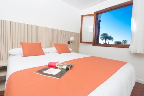 Posteľ alebo postele v izbe v ubytovaní Alsol Las Orquídeas