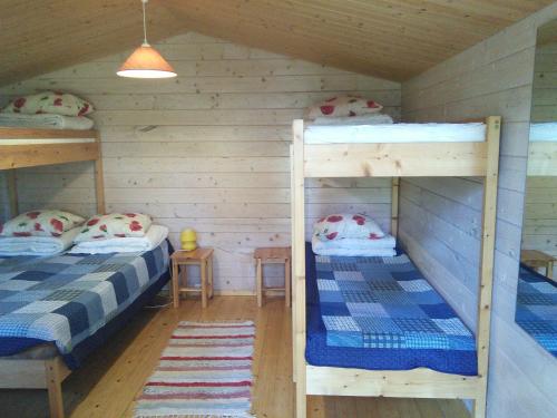 Postel nebo postele na pokoji v ubytování Paatsalu Camping