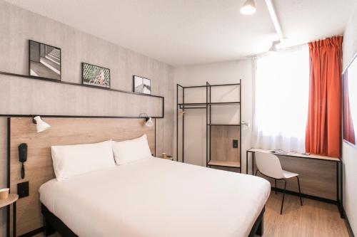 Postel nebo postele na pokoji v ubytování ibis Avignon Sud