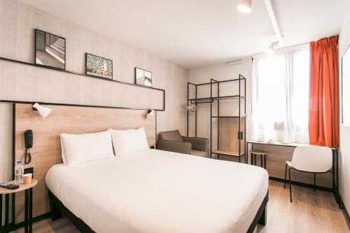 Postel nebo postele na pokoji v ubytování ibis Avignon Sud