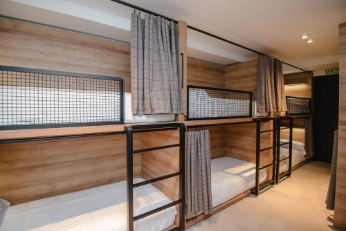 a group of bunk beds in a room at LATROUPE La Granja in Bilbao
