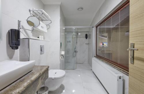 Ένα μπάνιο στο Arus Hotel