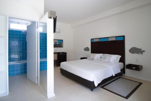 Un ou plusieurs lits dans un hébergement de l'établissement Hotel Dunas de Sal
