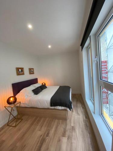 Katil atau katil-katil dalam bilik di Apartamentos Sun si Moon