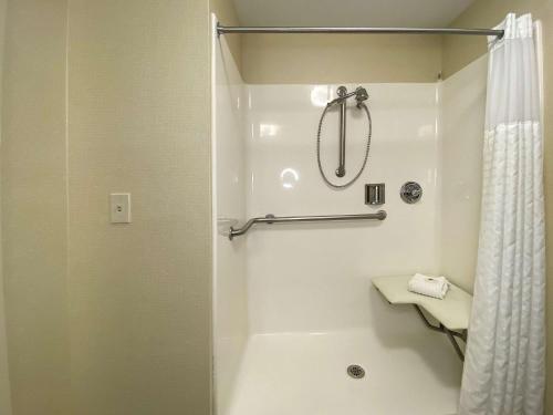 a bathroom with a shower with a shower curtain at Comfort Inn East Windsor - Springfield in East Windsor