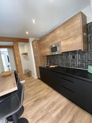 Dapur atau dapur kecil di Apartamentos Sun si Moon