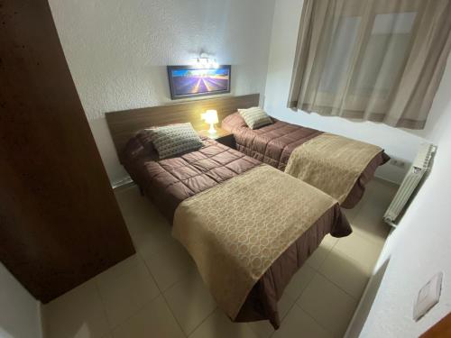 Katil atau katil-katil dalam bilik di Apartamentos AR Isern