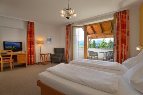 Postel nebo postele na pokoji v ubytování Hotel Magerl